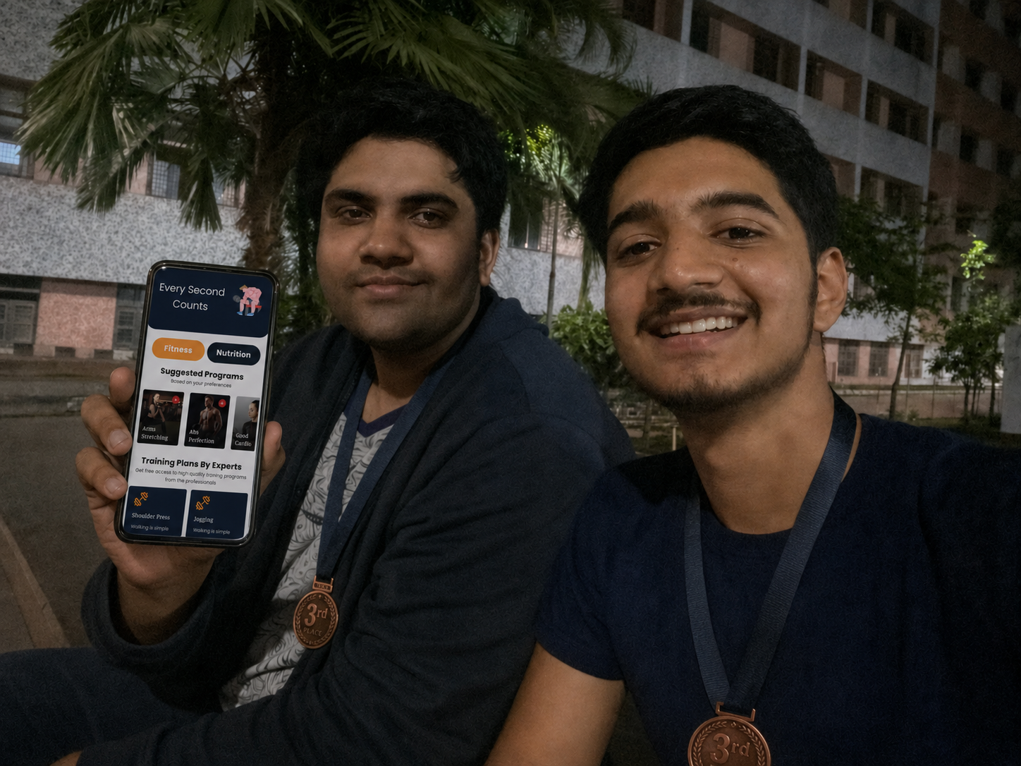 Team Alpha with their 3rd-place medals, showing the Every Second Counts app